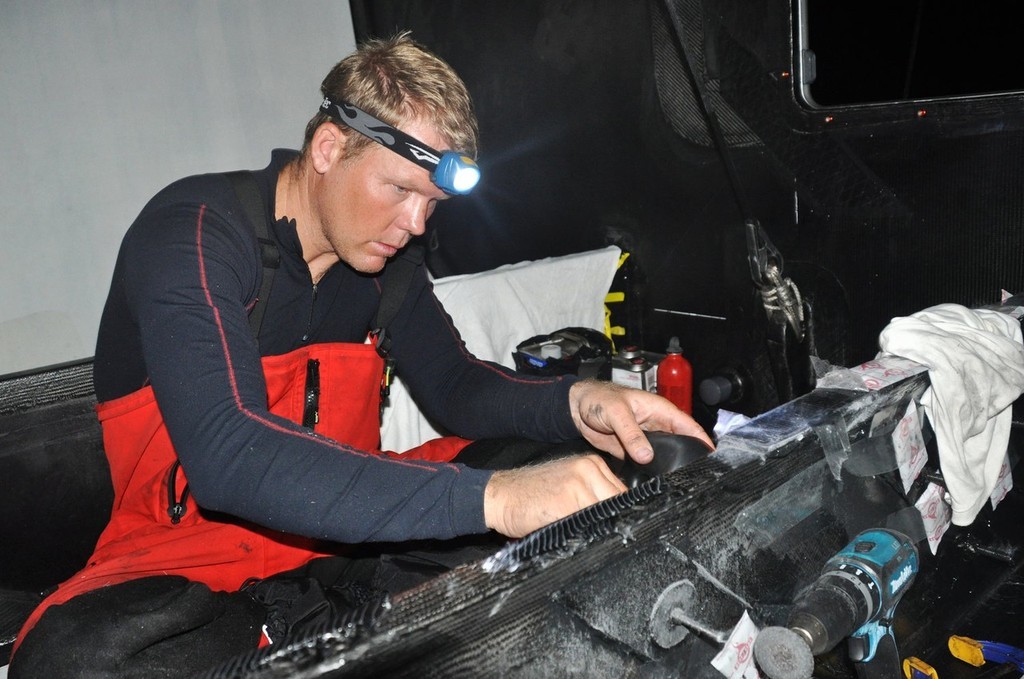 Rick Deppe/PUMA Ocean Racing/Volvo Ocean Race.<br />
Caey Smith from Australia makes final repairs to the bow. The crew of PUMA Ocean Racing make repairs to their boat after sustaining serious structural damage in rough seas, for the second time in 24 hours.<br />
 &copy; Rick Deppe/PUMA Ocean Racing/Volvo Ocean Race http://www.volvooceanrace.org