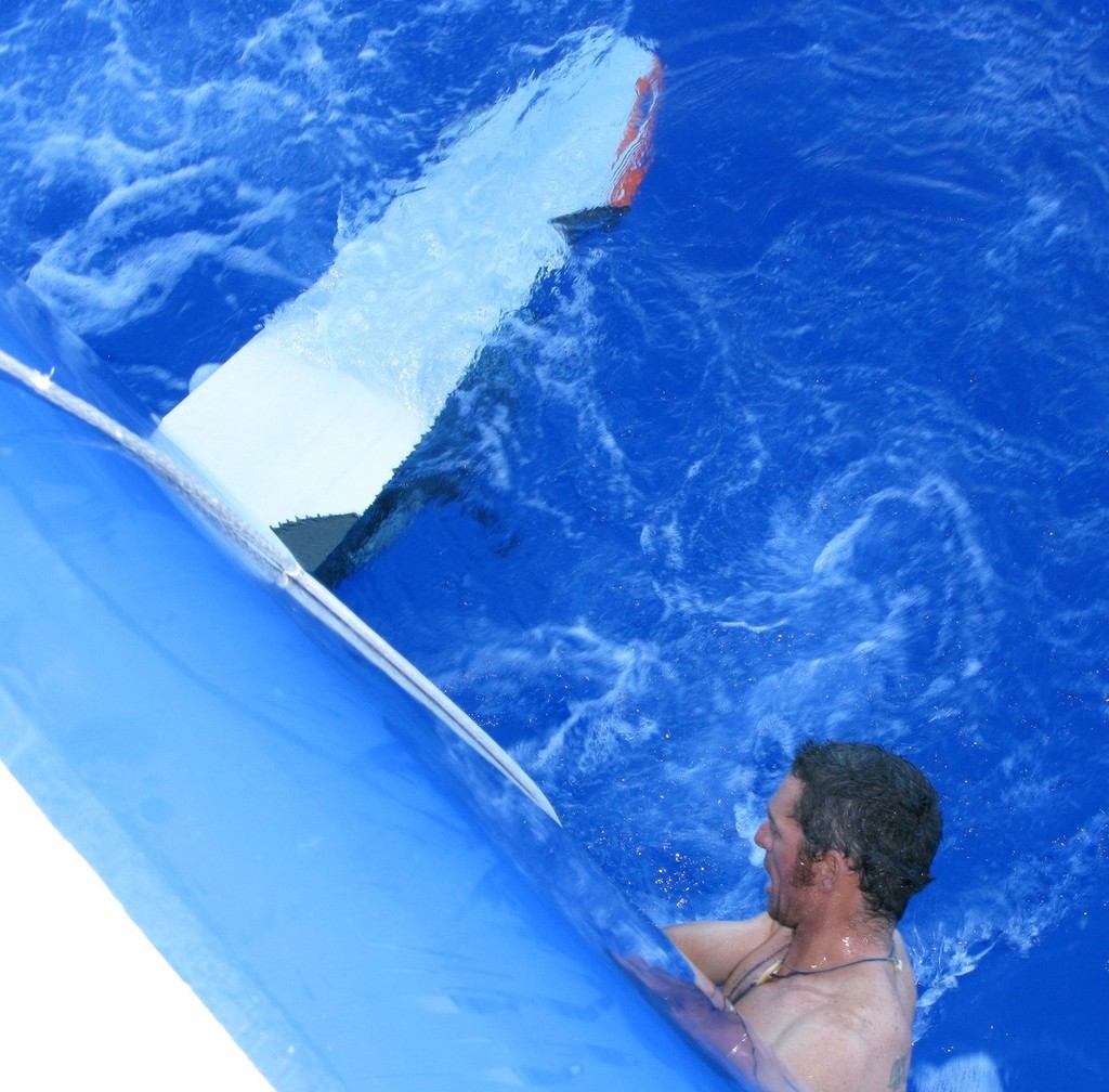 Pepe Ribes from Spain checking the broken daggaboard onboard Telefonica Blue.  <br />
The daggerboard snapped on 23/11/08 on leg 2 from Cape Town, South Africa to Cochin, India. © Gabriele Olivo/Telefonica Blue/Volvo Ocean Race http://www.volvooceanrace.org