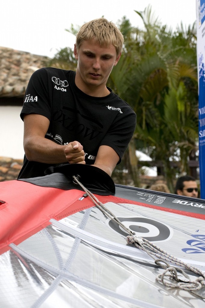 For EDITORIAL USE only, Dave Kneale/Volvo Ocean Race

Oliver-Tom Schliemann, representing Germany in the Boys RS:X Windsurfer class, prepares his rig at the Volvo Youth Sailing ISAF World Championship 2009 in Buzios, Brazil

The 39th Volvo Youth Sailing ISAF World Championship is being hosted by Buzios, Brazil in the Bay of Buzios, from the 10th to the 17th July 2009. This event is the pinnacle of the youth sailing calendar, with past notable winners including American's Cup skipp photo copyright  David Kneale/Volvo Ocean Race http://www.volvooceanrace.com/ taken at  and featuring the  class