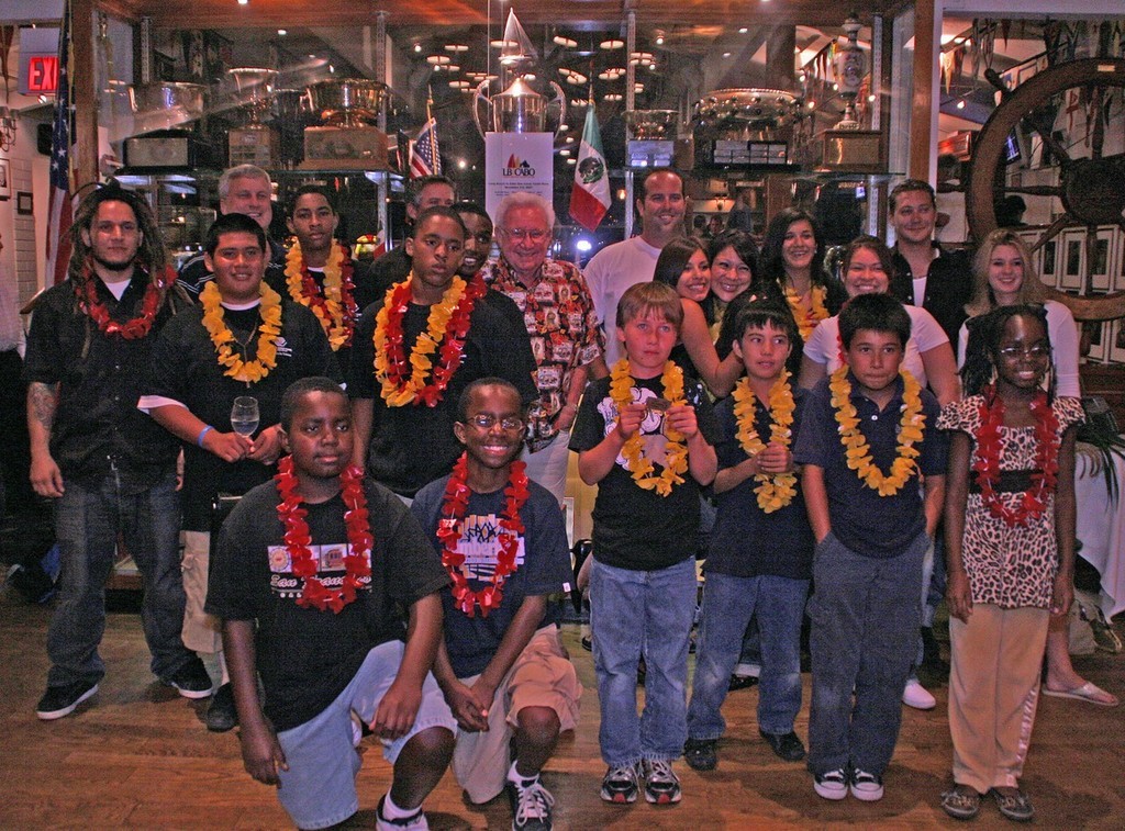 Young people from Boys and Girls Club’s of Long Beach, NAACP and Artesia High School pose in front of the LBYC trophy case with Sailing Foundation staff and volunteers - 2007 LBYC Wet Wednesday Series  © Rick Roberts 