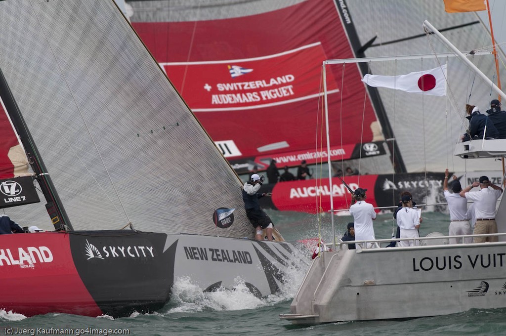 And then both Greek Challenge and Alinghi are away through the start line. © Juerg Kaufmann go4image.com http://www.go4image.com