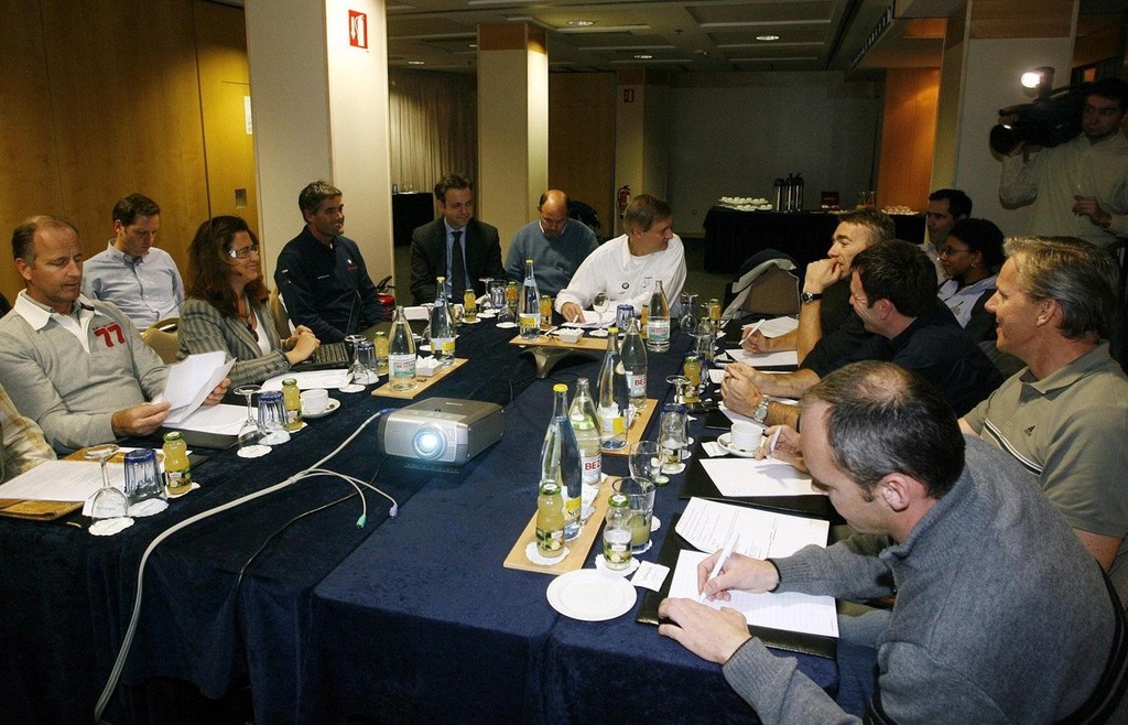  Some of the 24 Challenger representatives gather around the table in Valencia, with the others communicating by telephone. - photo © Valenciasailing.com