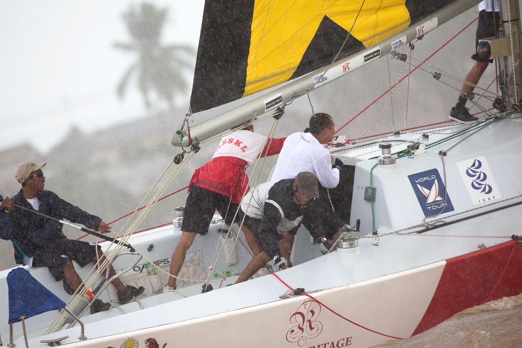 Rizal Mahadi bin Sazali rounds the top mark in Monsoon conditions on day 1 of the Malaysian Match Racing Championships 2009. Kuala Terengganu, Malaysia. 23 November 2009. Photo: Gareth Cooke/Subzero Images © Gareth Cooke Subzero Images/Monsoon Cup http://www.monsooncup.com.my