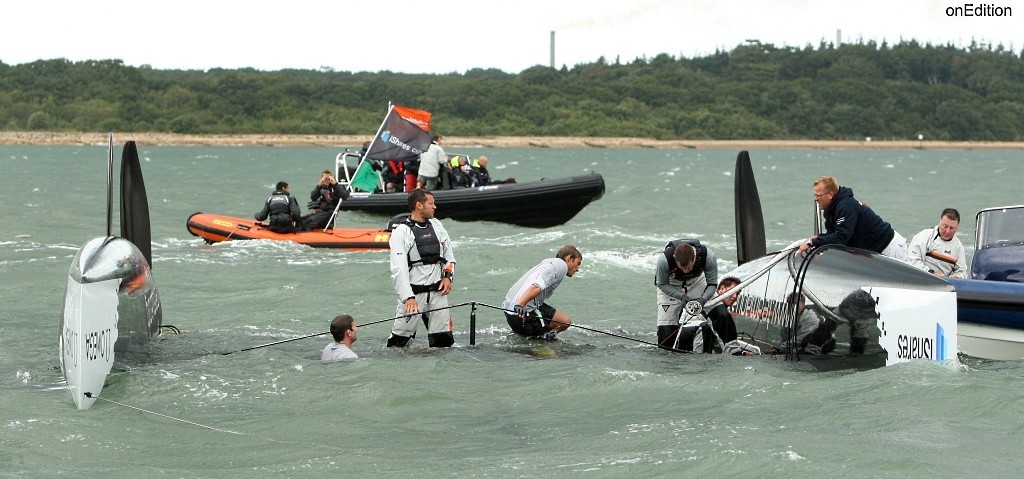 Team Aqua after capsizing during the iShares Cup - Skandia Cowes Week 2008 © onEdition http://www.onEdition.com