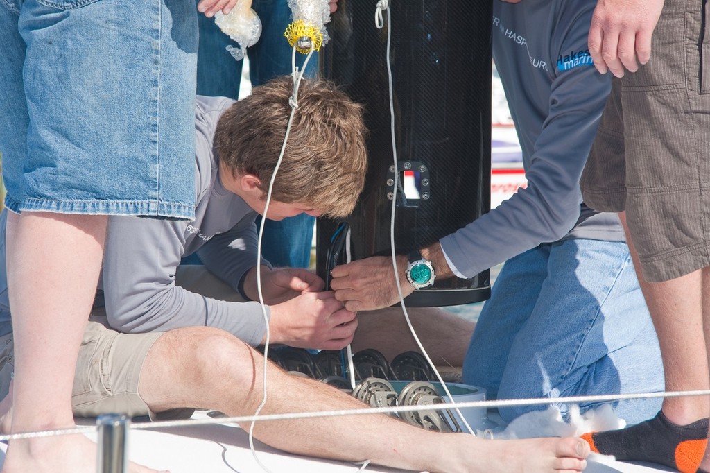 Electronic cabling is safely tucked away before the final stepping of the mast. - Launch of Haspa Hamburg © Adrian Rumney