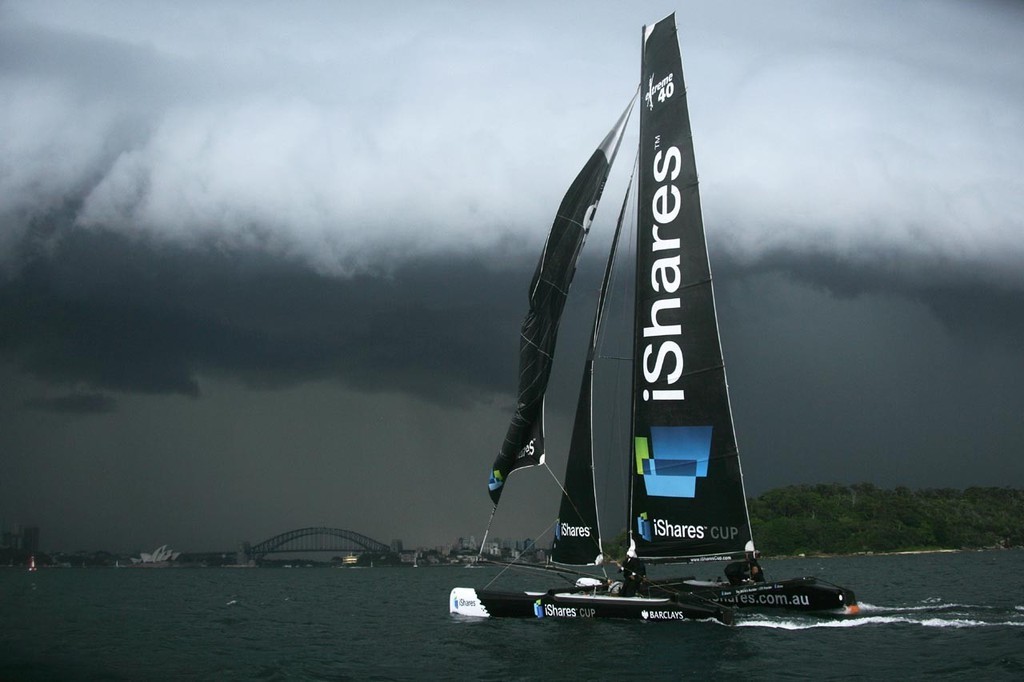 Extreme 40 on Sydney Harbour in a thunderstorm.  iShares/ Sabine Albers © Extreme 40s