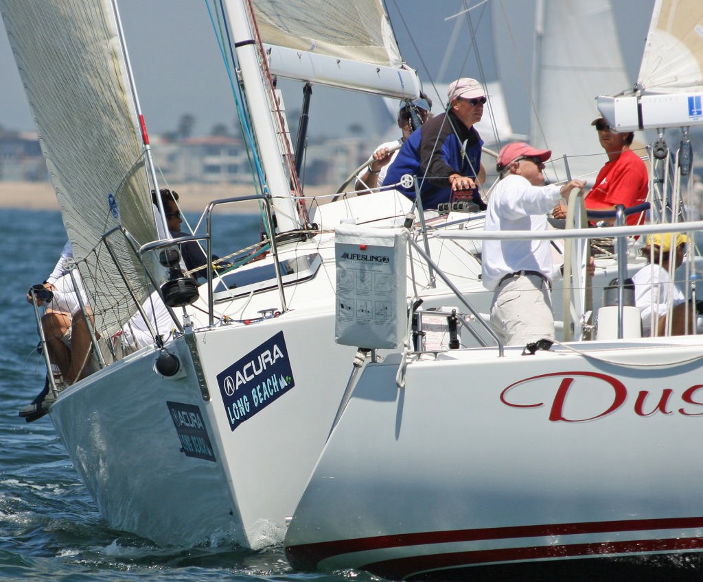 In the J109 race, Tom and Coriena Dingman's Duster lead John Shulze's Linstar around the windward mark - Ullman Sails Long Beach Race Week photo copyright Rich Roberts http://www.UnderTheSunPhotos.com taken at  and featuring the  class