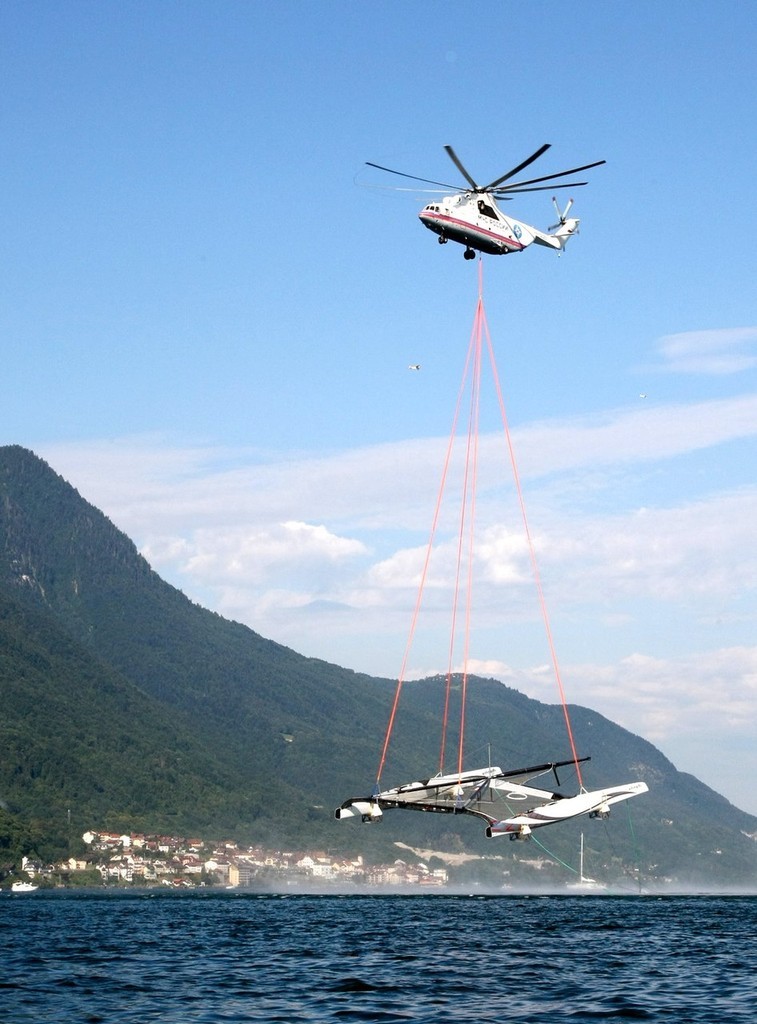 Alinghi 5 lifts off - flight for Genova, Italy © M. Martinoli