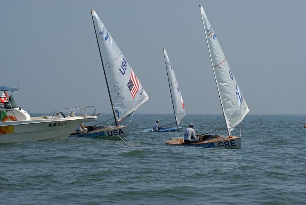  Emilious Papathanasiou (GRE) leads Zach Railey (USA) across the finsh line in Race 3 of the Finn class. photo copyright Richard Gladwell www.photosport.co.nz taken at  and featuring the  class