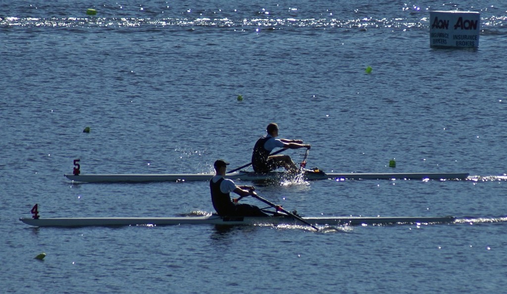 America’s Cup grinder, Rob Waddell, nearest camera edges out current and then-triple world champion, Mahe Drysdale at the 1750 metre mark at Lake Karapiro, back in January 2008. Drysdale went on to repeat Waddell’s Olympic Gold Medal in 2012. © Richard Gladwell www.photosport.co.nz