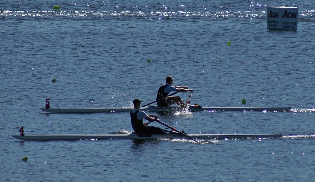 America’s Cup grinder, Rob Waddell, nearest camera edges out current and then-triple world champion, Mahe Drysdale at the 1750 metre mark at Lake Karapiro, back in January 2008. Drysdale went on to repeat Waddell&rsquo;s Olympic Gold Medal in 2012. photo copyright Richard Gladwell www.photosport.co.nz taken at  and featuring the  class