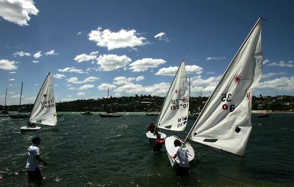 Competitors struggle to come ashore in the windy conditions after practice as part of the Sydney 2009 World Masters Games at Woollahra Sailing Club (Photo by Matt King/Getty Images for Sydney 2009 World Masters Games. Images courtesy of  the Sydney 2009 World Masters Games Organising Committee.) © Getty Images