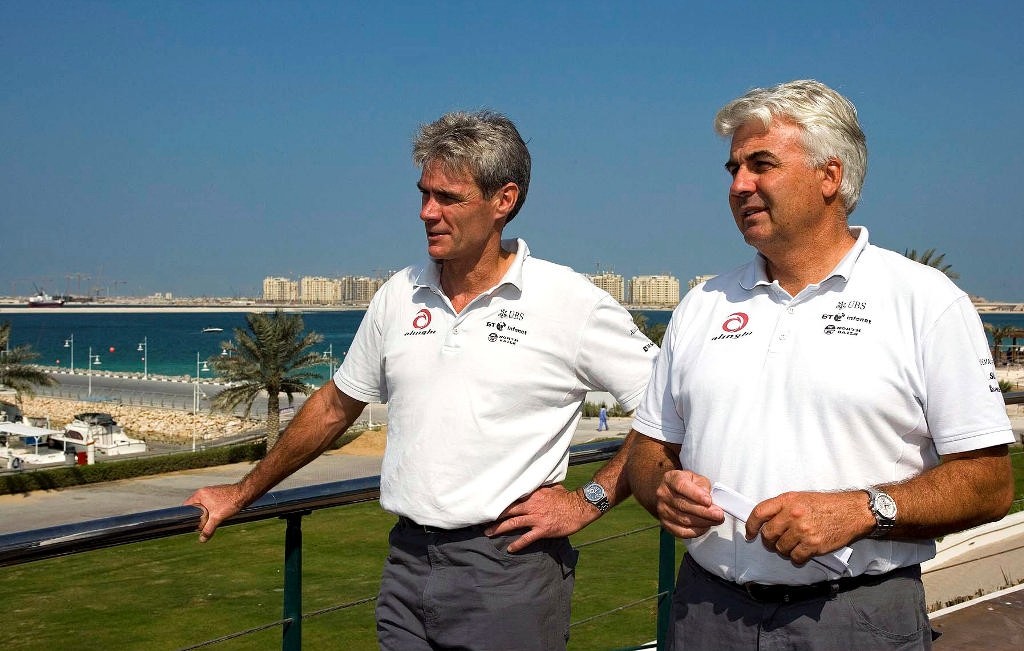 Grant Simmer, Alinghi managing director and design team coordinator (left) and Brad Butterworth, Alinghi team skipper and tactician (right) in front of the Dubai International Marine Club. photo copyright Thierry Martinez/Alinghi - Copyright taken at  and featuring the  class