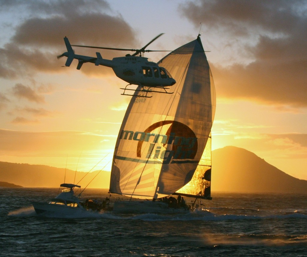 Hawaiian sunrise chases Morning Light to the finish. - Transpac 2007 photo copyright Rich Roberts http://www.UnderTheSunPhotos.com taken at  and featuring the  class
