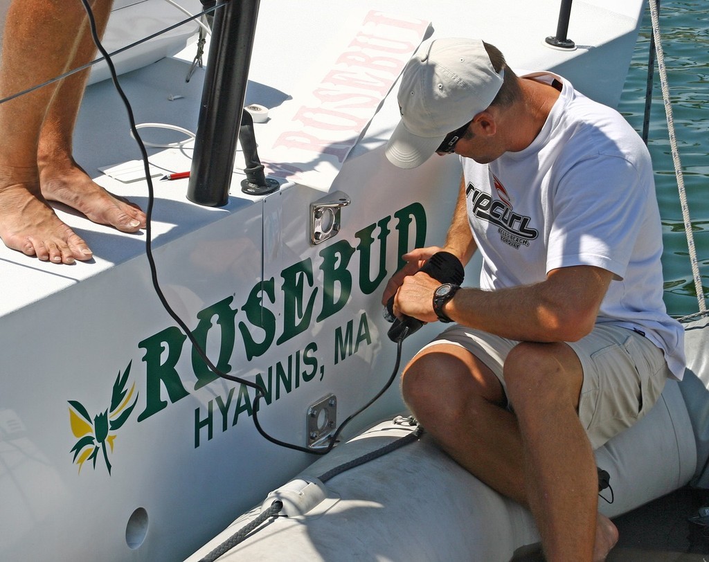 Crew member Anthony Merrington puts finishing touch on Rosebud - Transpac 2007 © Rich Roberts http://www.UnderTheSunPhotos.com