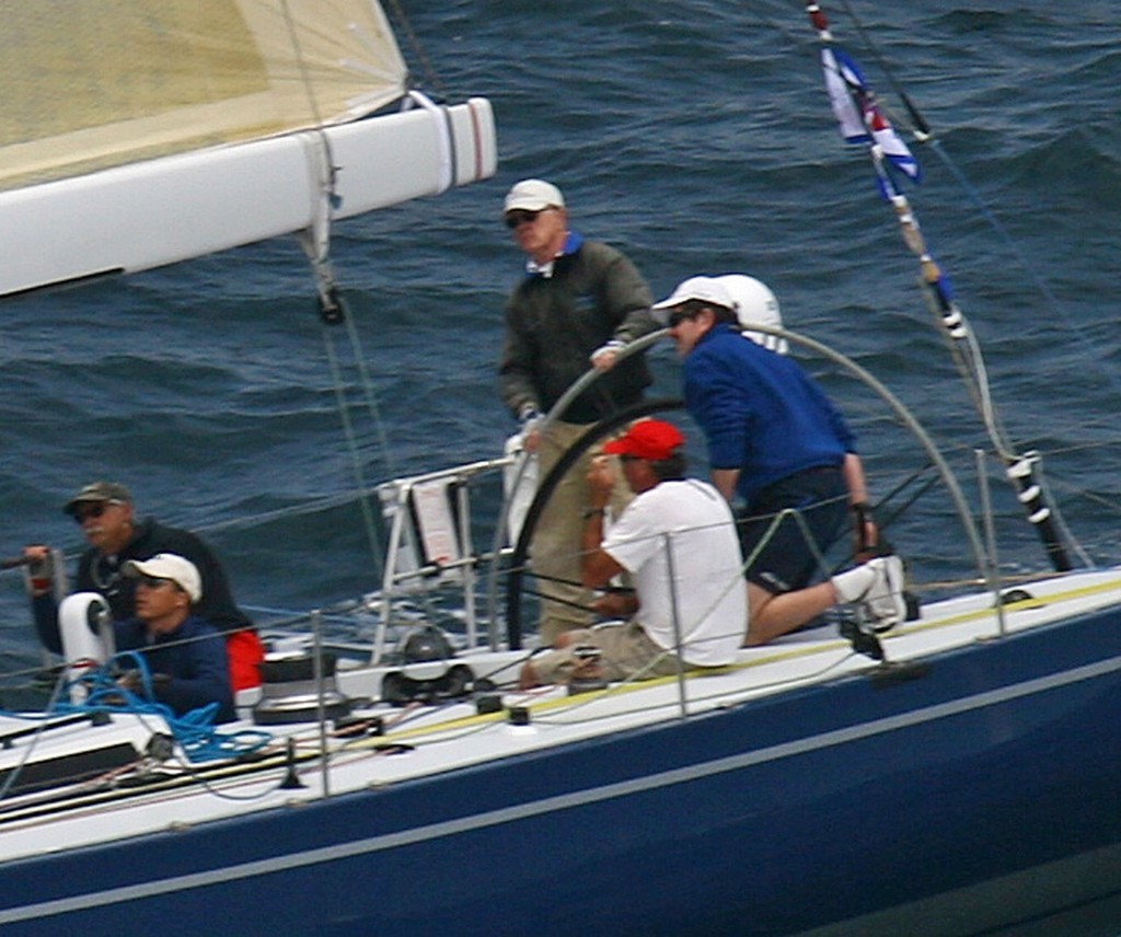 Brack Duker drives Holua, the overall leader; Mark Rudiger at right, Dave Ullman far left. - Transpac 2007 © Rich Roberts http://www.UnderTheSunPhotos.com