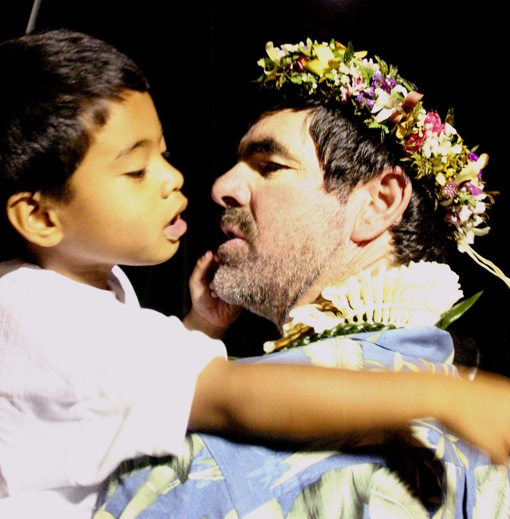Mark Rudiger (Rudi) being greeted by son Zayle at the finish of Transpac 2003  © SW