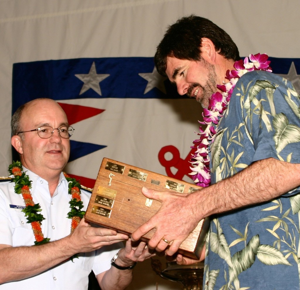 Mark Rudiger receiving the Don Vaughn Trophy (best crew on first boat to finish), one of several he won. photo copyright SW taken at  and featuring the  class