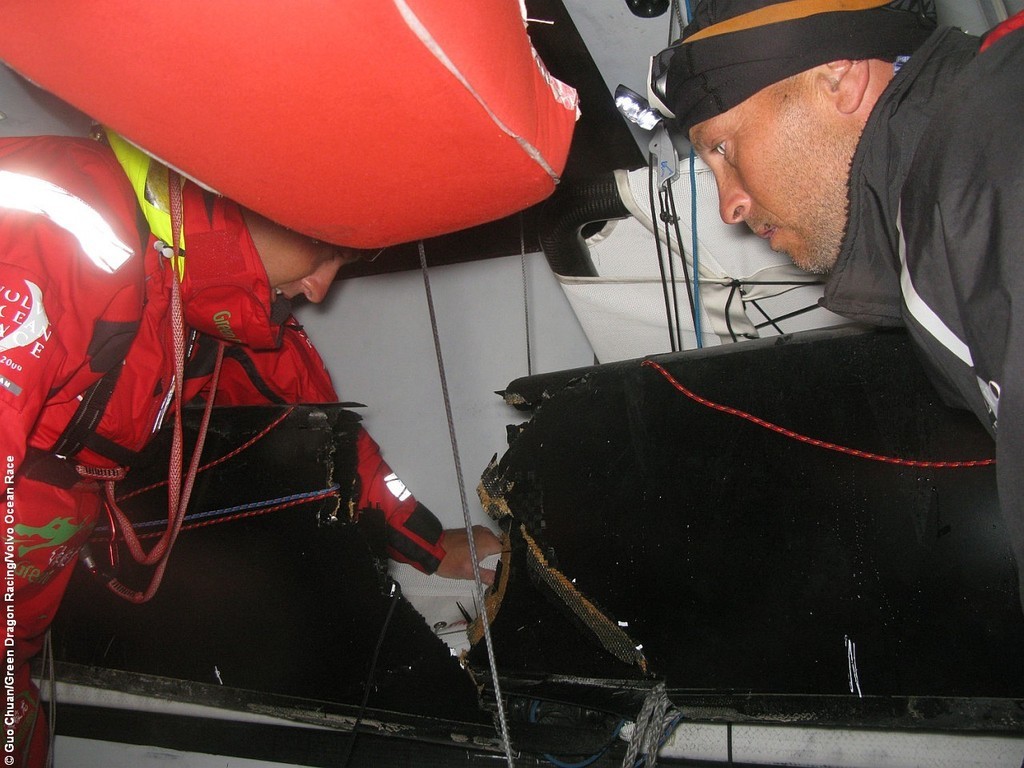 Anthony McLean and Tom Braidwood think about how to fix their broken boom, on leg 2 of the Volvo Ocean Race photo copyright Guo Chuan/Green Dragon Racing/Volvo Ocean Race http://www.volvooceanrace.org taken at  and featuring the  class
