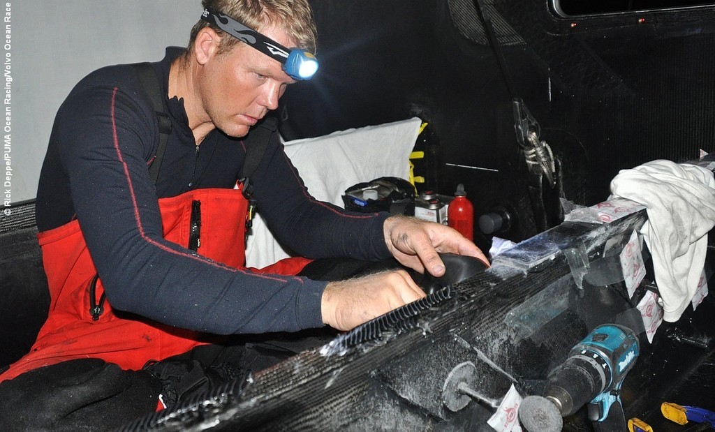 Casey Smith from Australia makes final repairs to the bow of Puma © Rick Deppe/PUMA Ocean Racing/Volvo Ocean Race http://www.volvooceanrace.org