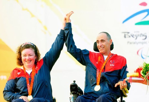 Gold medallist in the SKUD18 Maureen McKinnon-Tucker and Nick Scandone of USA celebrate - 2008 Paralympics - Qingdao © Sailing2008.com