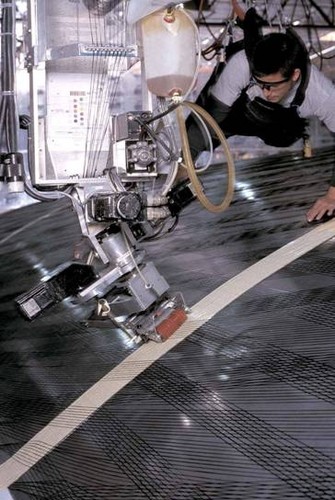 The 3DL fiber head used to apply yarns on the mold operates at a surface pressure of 5 lbs. per square inch. The original 3DL fiber head used in 1992-2000 exerted a surface pressure of 28 lbs. per square inch.  © North Sails http://www.northsails.com/