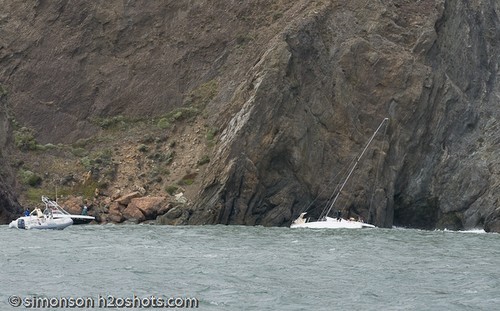 Savage Beauty on the rocks in San Francisco - crew still aboard two private boats standing by. © Erik Simonson/ h2oshots.com