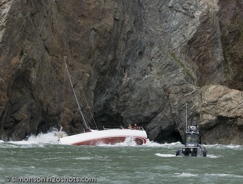 Savage Beauty on the rocks in San Francisco - the next set hit - the Sheriff’s RIB has backed off in the set - her crew are all still aboard SB © Erik Simonson/ h2oshots.com