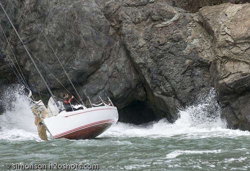 Savage Beauty on the rocks in San Francisco- waiting for a set of 10ft swells to roll through © Erik Simonson/ h2oshots.com