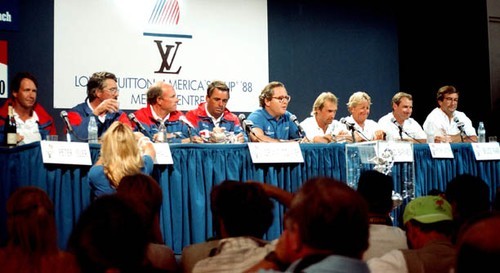 America’s Cup 88 Media Conference - L-R is Peter Isler, John Marshall, Tom Whidden, Dennis Conner, moderator Bruno Trouble’, NZ skipper David Barnes, Peter Lester, Bruce Farr, Michael Fay. © Rich Roberts http://www.UnderTheSunPhotos.com