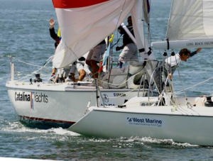Russell Coutts (r.) tangles with Chris Law at the leeward mark ion the Congressional Cup © Rich Roberts http://www.UnderTheSunPhotos.com