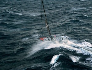 Alex Thompson runs for a safe port in the Velux 5 Oceans race photo copyright onEdition http://www.onEdition.com taken at  and featuring the  class