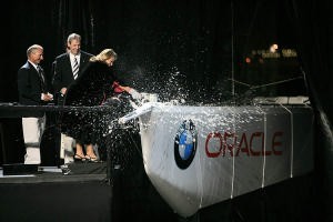 Sue Dickson breaks the traditional bottle champagne over the bow uf USA-87 photo copyright BMW Oracle Racing Photo Gilles Martin-Raget http://www.bmworacleracing.com taken at  and featuring the  class