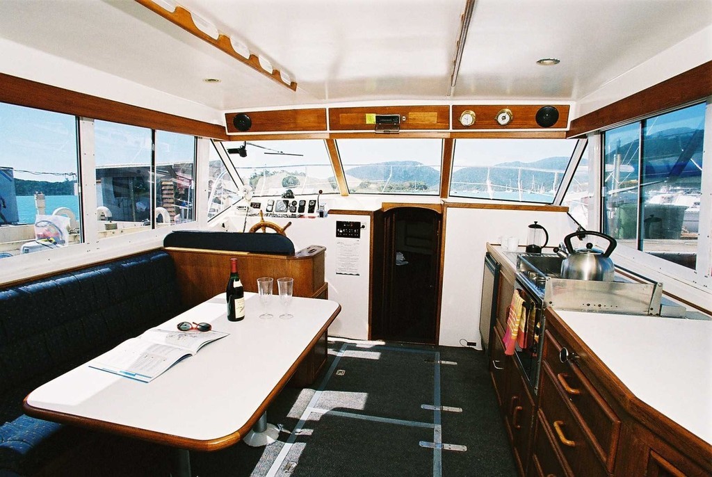 Fiji Fairway 36 interior saloon - Cruise through the Whitsundays photo copyright Deni Linforth taken at  and featuring the  class