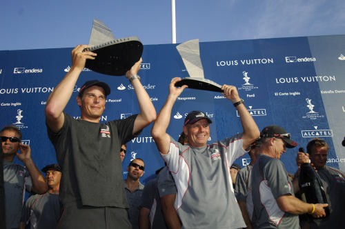 Emirates Team New Zealand Helmsman Dean Barker and CEO Grant Dalton hold up the trophies the team won for Louis Vuitton Act 12 and 2006 season. 2/7/2006 © Chris Cameron/ETNZ http://www.chriscameron.co.nz