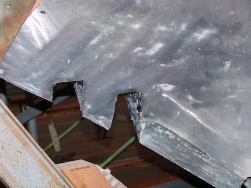 The ends of the 40year old keel bolts have been exposed prior to removal. © Richard Gladwell www.photosport.co.nz
