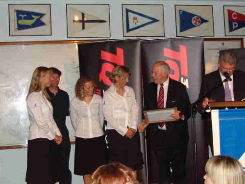 Sharon Ferris, Ashley Holtum, Raynor Smeal and Bruce Kendall (coach), receive their Merit Award for second place in the 2005 Olympic Yngling Worlds.. © Richard Gladwell www.photosport.co.nz