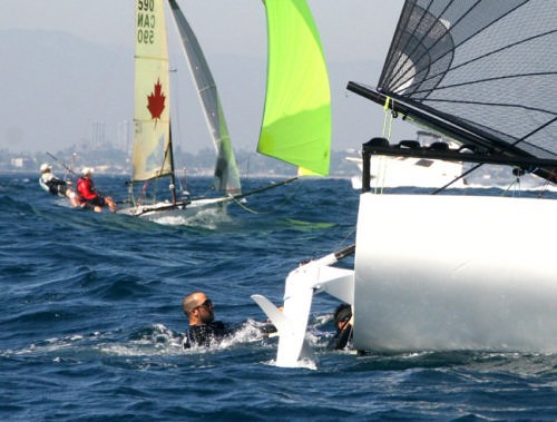 <b>Paul Galvez (at boat) and crew Leon de la Barra recovered for a decent finish in tough sailing </b><br />
 © Rich Roberts http://www.UnderTheSunPhotos.com