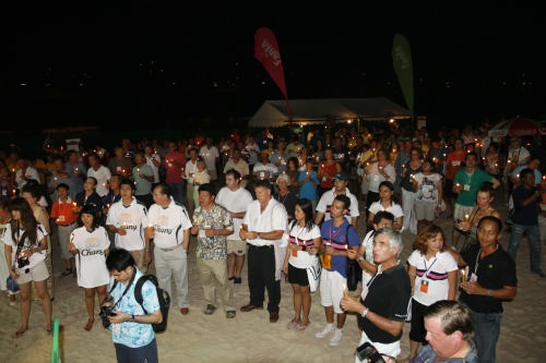Phuket King’s Cup 2008. The King’s Cup crowd lights candles and wishes His Majesty 