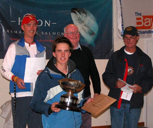 Ben Price accepts the B.K Price Trophy. L-R PESC Vice Commodore Steve Harrison, Ben Price, John Price, Commodore Gavin Rigby © Sue Hall