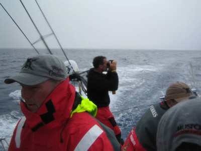 Skipper PaulCayard stands on the stern trying to snap some of the passing wildlife Day6 Leg 2 aboard Volvo Open 70 The Black Pearl ©Justin Clougher<br />
 © Volvo Ocean Race http://www.volvooceanrace.com