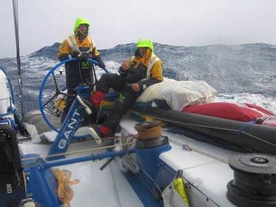 Limping under storm jib1 Johnathan Swain helms and Peter Doriean on deck on Volvo Open 70 movistar heads for Ushuaia to effect repais to the damaged bomb doors on the keel box ©Pepe Ribes  © Volvo Ocean Race http://www.volvooceanrace.com