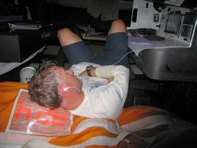 Andrew Cape asleep at the navigation station onboard movistar. Volvo Ocean Race Leg 5 from Rio to Baltimore.  © Volvo Ocean Race http://www.volvooceanrace.com