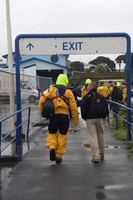 A movistar crewman walks up the dock at Falmouth © Oskar Kihlborg/  © Volvo Ocean Race http://www.volvooceanrace.com