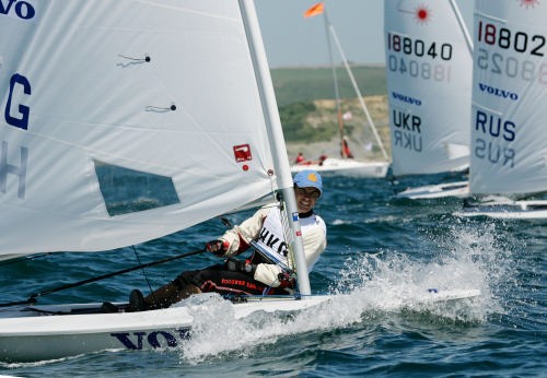 Jamie Dalton from Hong Kong competing in the Laser class on the first day of racing at the Volvo Youth Sailing ISAF World Championship 2006. © onEdition http://www.onEdition.com