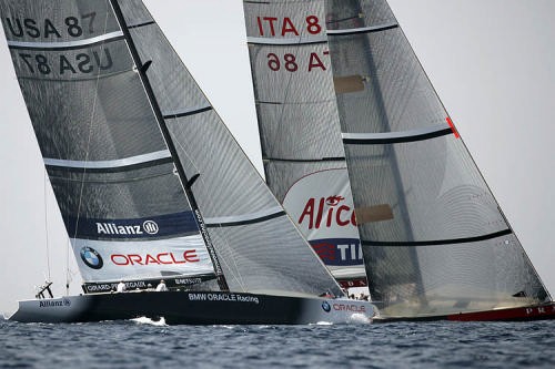 A close cross between BMW ORACLE vs Luna Rossa on Day 5 of Louis Vuitton Act 12 © BMW Oracle Racing Photo Gilles Martin-Raget http://www.bmworacleracing.com
