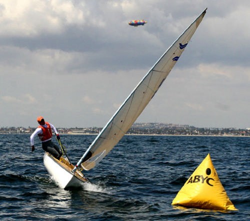 Zach Railey roll-tacks his Finn at the windward mark. © Rich Roberts http://www.UnderTheSunPhotos.com
