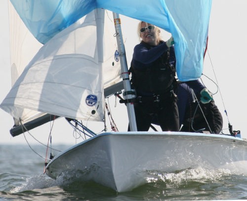  Women’s 470 winners (and second overall vs. men) Amanda Clark and crew Sarah Mergenthaler douse spinnaker <br />
 © Rich Roberts http://www.UnderTheSunPhotos.com