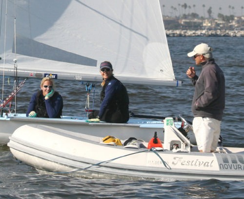 Clark (right) and Mergenthaler consult with Coach Ian (Bunny) Warren after winning a race Sunday <br />
 © Rich Roberts http://www.UnderTheSunPhotos.com