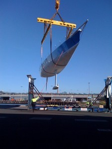 Lahana, being unloaded from her shipping crate, after her arrival at Port Kembla - Audi Sydney Gold Coast Yacht Race photo copyright  Andrea Francolini Photography http://www.afrancolini.com/ taken at  and featuring the  class